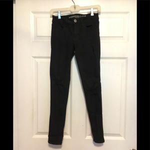 American Eagle black distressed jeggings
